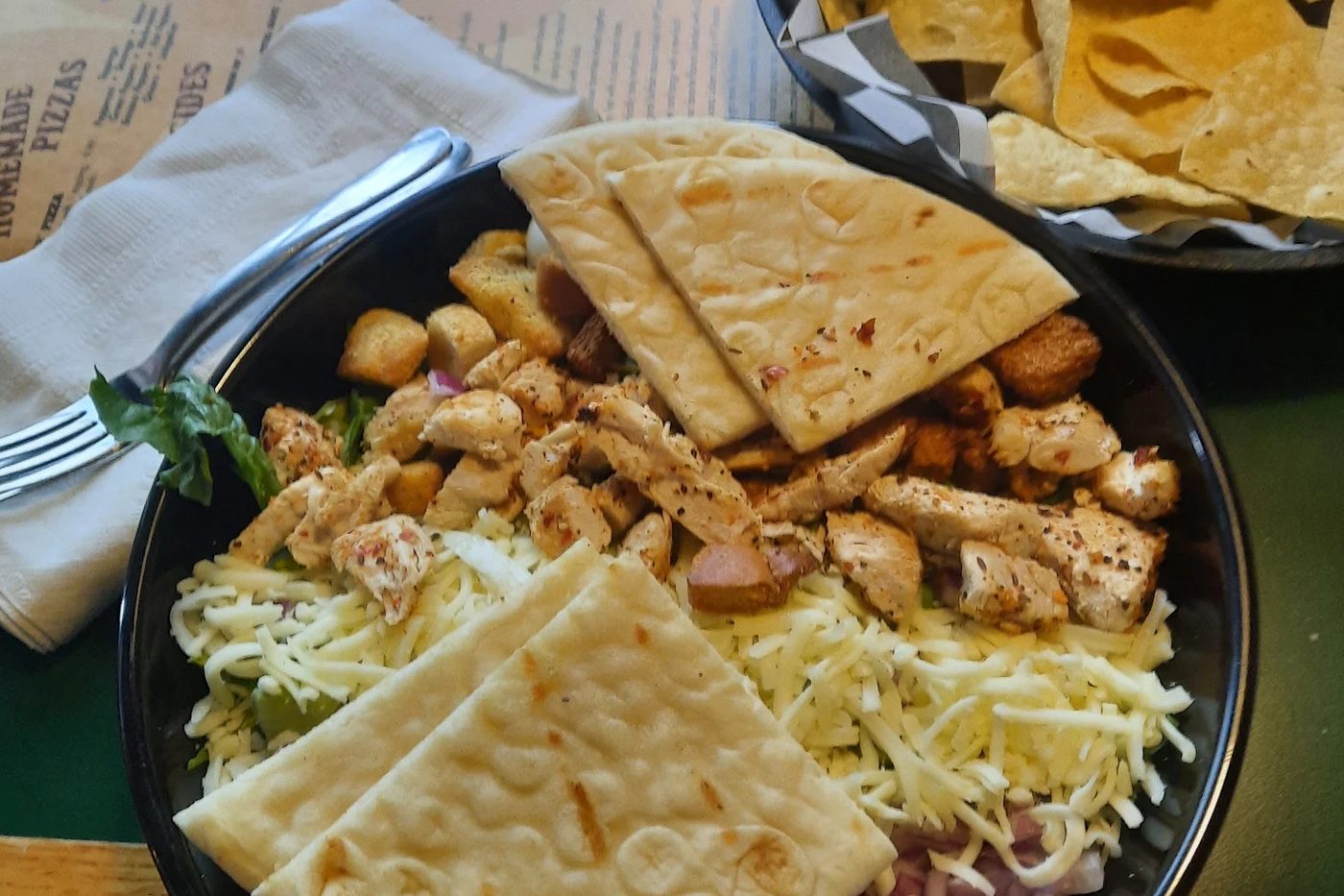 Grecian salad with grilled chicken and pita